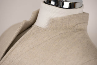 Light beige Lozenge coat with warm padded lining