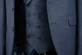 Zils Quesste slim fit uzvalks ar divrindu pogu vesti