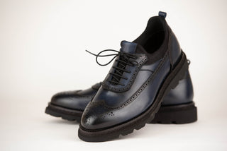 Tumši zilas Toroslar ādas kurpes ar masīvu zoli