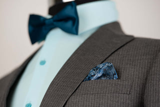 Grey striped Quesste extended suit with a vest