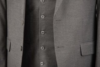 Grey striped Quesste extended suit with a vest