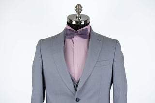 Light blue Quesste extended suit with a vest