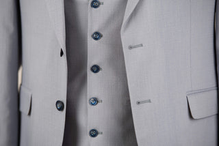 Light blue Quesste extended suit with a vest