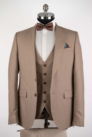 Light brown Quesste extended suit with a vest
