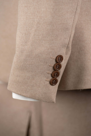 Light brown Quesste extended suit with a vest