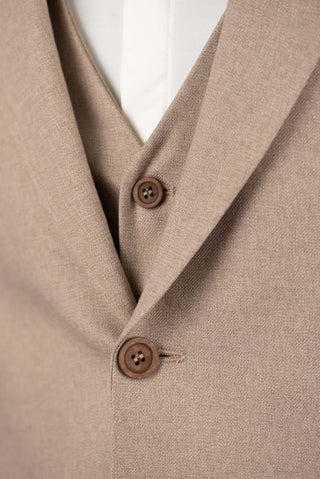 Light brown Quesste extended suit with a vest
