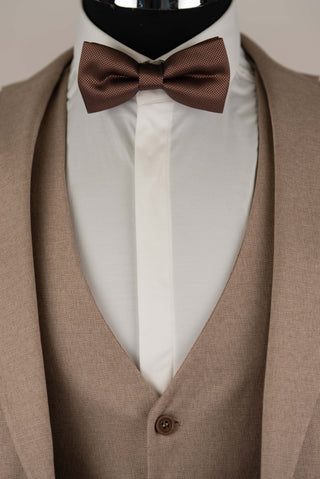Light brown Quesste extended suit with a vest