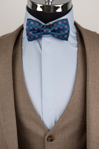Brown Quesste extended suit with a vest