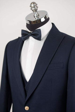 Dark blue Quesste slim fit suit with gold buttons and a double-breasted vest