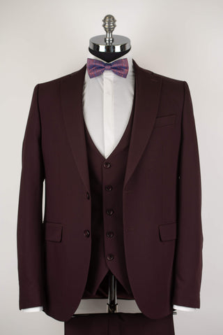 Dark burgundy Quesste extended suit with a vest