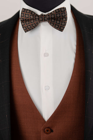 Black Quesste extended suit with plaid pattern and a brown vest