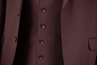 Dark burgundy Quesste extended suit with a vest