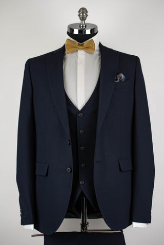 Dark blue Quesste extended suit with a vest