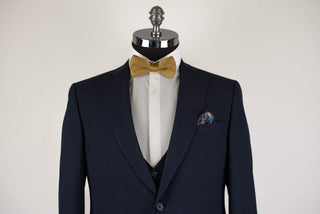 Dark blue Quesste extended suit with a vest