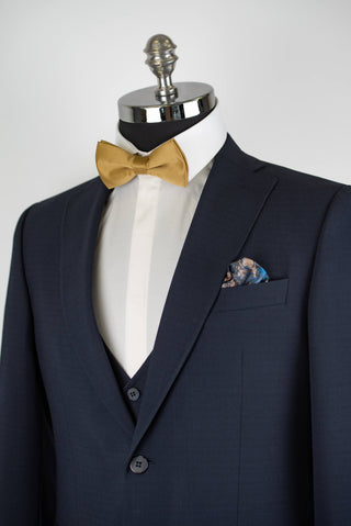 Dark blue Quesste extended suit with a vest