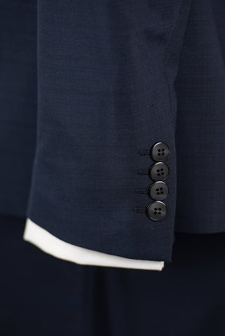 Dark blue Quesste extended suit with a vest
