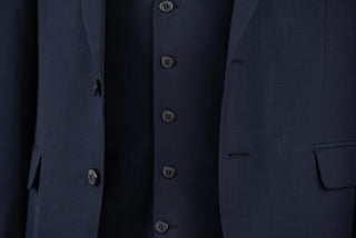 Dark blue Quesste extended suit with a vest