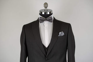 Black striped Quesste extended suit with a vest