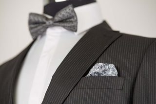Black striped Quesste extended suit with a vest