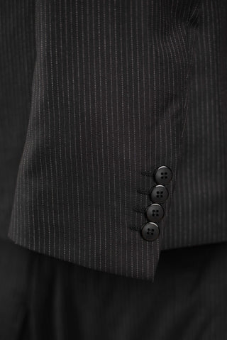 Black striped Quesste extended suit with a vest