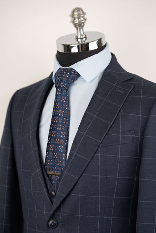 Dark blue Quesste extended suit with plaid pattern and a vest