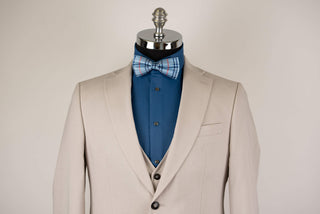 Light beige Quesste extended suit with a vest