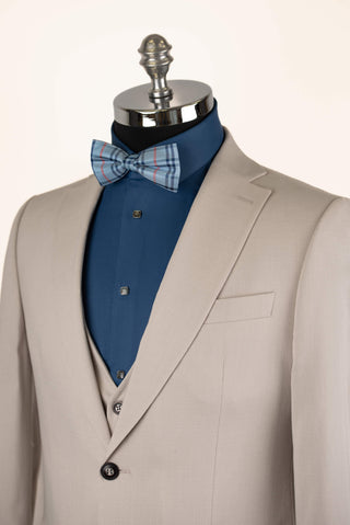 Light beige Quesste extended suit with a vest