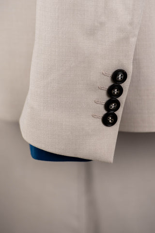 Light beige Quesste extended suit with a vest