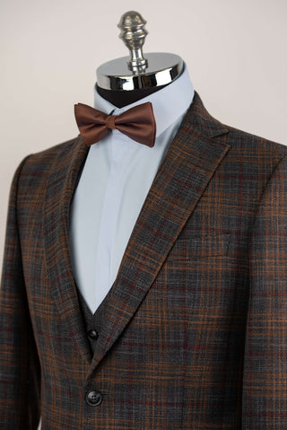 Grey Quesste extended suit with brown, burgundy plaid pattern and a vest