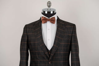 Dark grey Quesste extended suit with brown plaid pattern and a vest