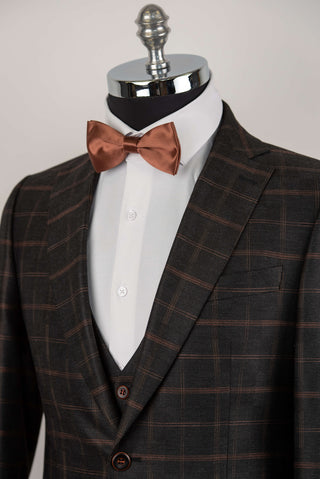 Dark grey Quesste extended suit with brown plaid pattern and a vest