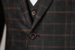 Dark grey Quesste extended suit with brown plaid pattern and a vest