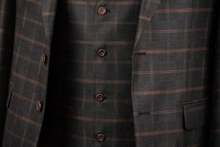 Dark grey Quesste extended suit with brown plaid pattern and a vest