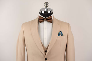 Beige Quesste extended suit with a vest