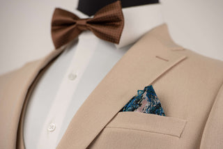 Beige Quesste extended suit with a vest