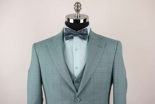 Soft turquoise Azzaro slim fit suit with a vest and a plaid pattern