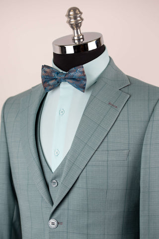 Soft turquoise Azzaro slim fit suit with a vest and a plaid pattern