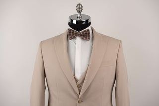 Beige Quesste extended suit with a vest