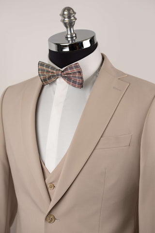 Beige Quesste extended suit with a vest