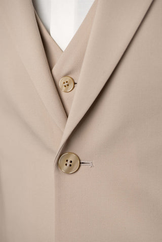 Beige Quesste extended suit with a vest