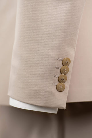 Beige Quesste extended suit with a vest