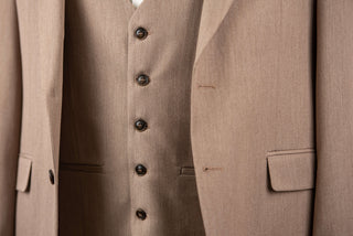 Dark beige Quesste extended suit with a vest