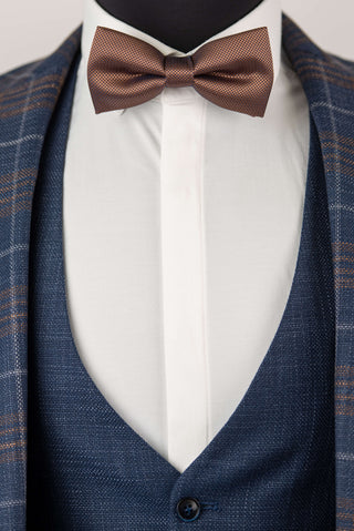 Blue Quesste extended suit with a vest and brown, grey plaid pattern