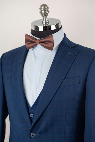 Blue Quesste extended suit with a vest and a soft plaid pattern