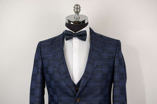 Dark blue Quesste extended suit with a vest and a plaid pattern