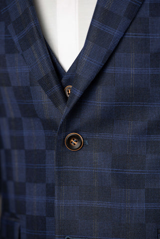Dark blue Quesste extended suit with a vest and a plaid pattern