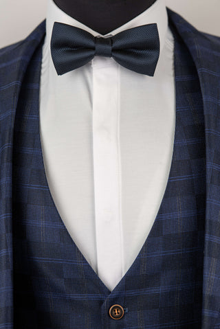 Dark blue Quesste extended suit with a vest and a plaid pattern