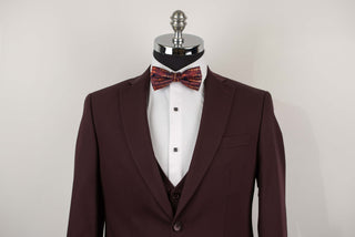 Dark burgundy Quesste extended suit with a vest