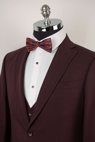 Dark burgundy Quesste extended suit with a vest