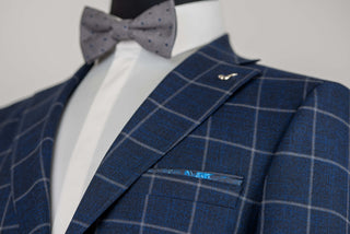 Blue Lucio extended suit with a light plaid pattern